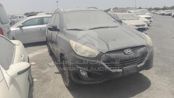 Photo 11 VIN: KMHJT81B3BU216121 - HYUNDAI TUCSON 