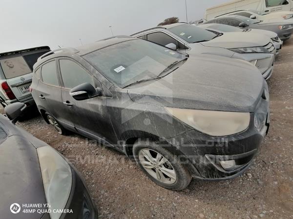 Photo 6 VIN: KMHJT81B6BU222088 - HYUNDAI TUCSON 