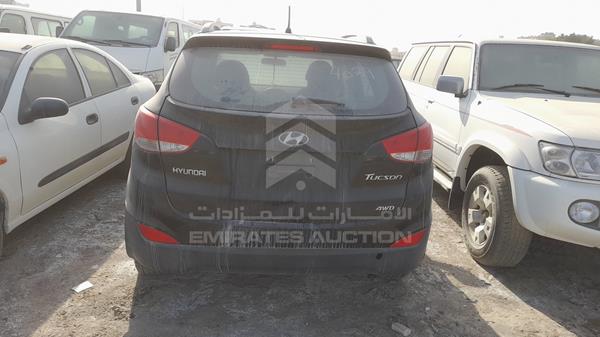 Photo 4 VIN: KMHJT81B8DU712485 - HYUNDAI TUCSON 