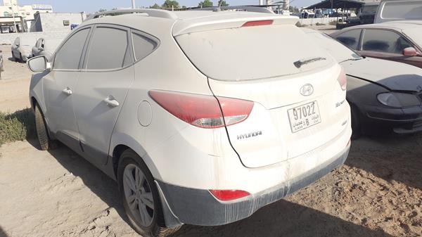 Photo 4 VIN: KMHJT81B8EU721429 - HYUNDAI TUCSON 