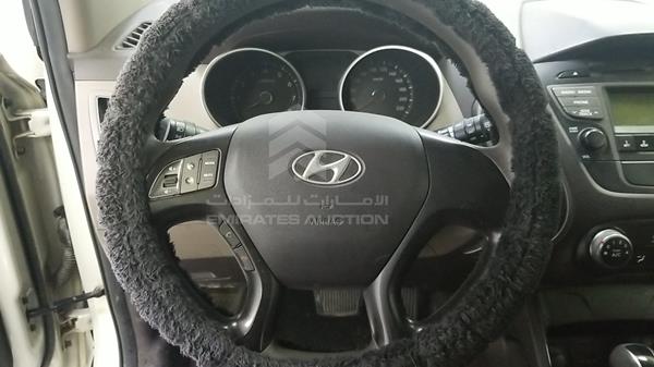 Photo 12 VIN: KMHJT81CXFU885243 - HYUNDAI TUCSON 