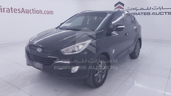 Photo 4 VIN: KMHJT81E0FU000422 - HYUNDAI TUCSON 