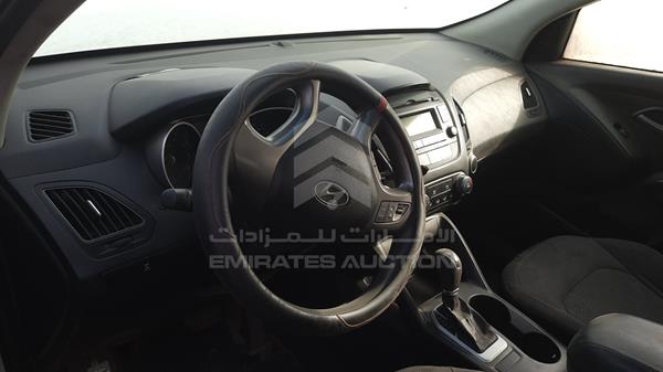 Photo 9 VIN: KMHJT81E4EU803040 - HYUNDAI TUCSON 