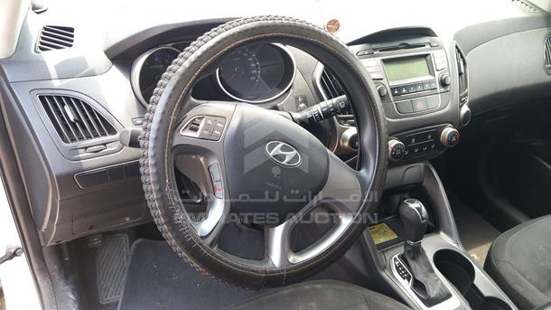 Photo 11 VIN: KMHJT81E6EU803797 - HYUNDAI TUCSON 