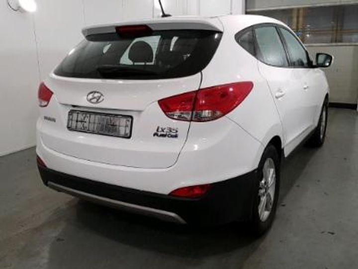 Photo 4 VIN: KMHJU816FGU000507 - HYUNDAI IX35 