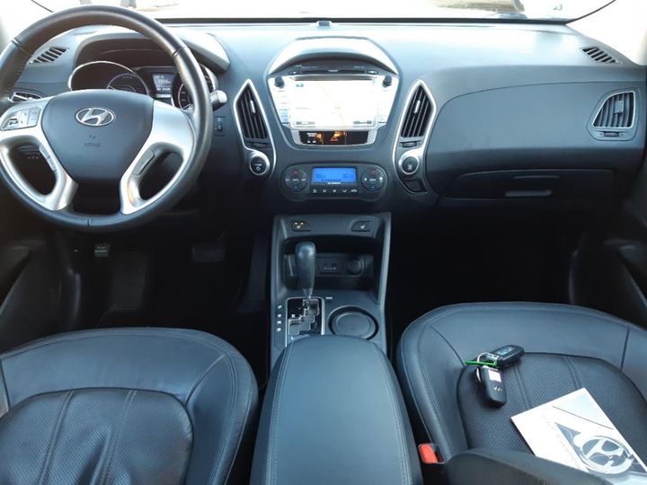 Photo 6 VIN: KMHJU816FGU000641 - HYUNDAI IX35 