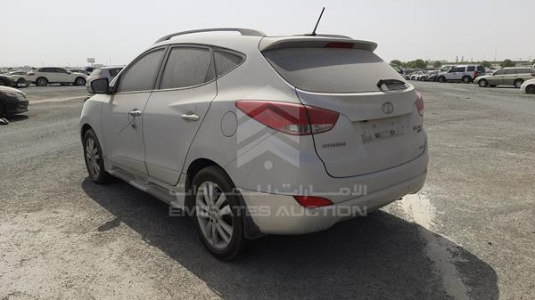 Photo 6 VIN: KMHJU81C6DU545811 - HYUNDAI TUCSON 