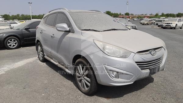 Photo 9 VIN: KMHJU81C6DU545811 - HYUNDAI TUCSON 