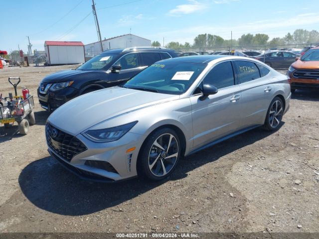 Photo 1 VIN: KMHL44J27PA289581 - HYUNDAI SONATA 