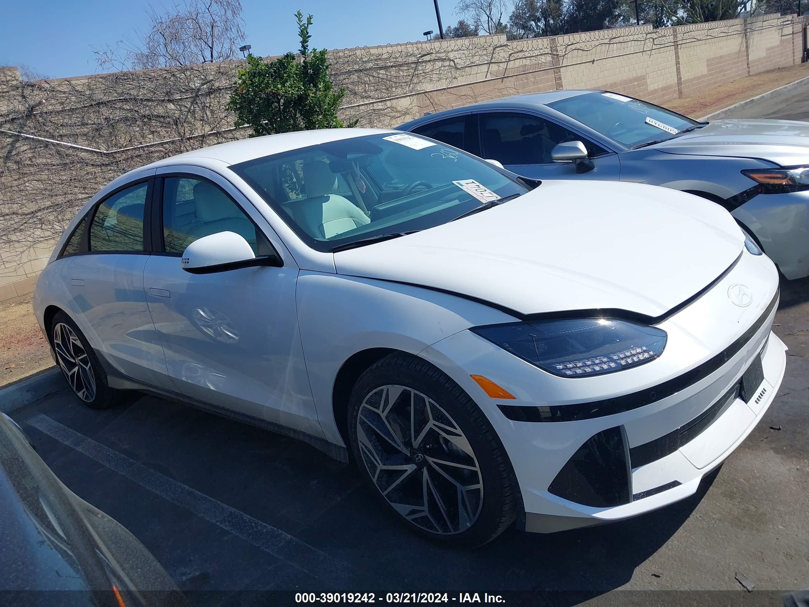 Photo 12 VIN: KMHM34AC4PA033656 - HYUNDAI IONIQ 