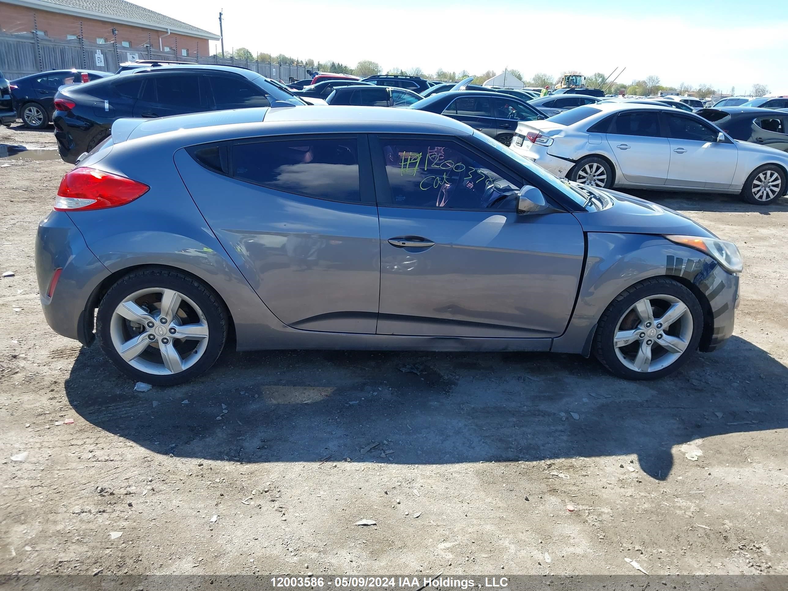 Photo 12 VIN: KMHTC6AD0CU030827 - HYUNDAI VELOSTER 