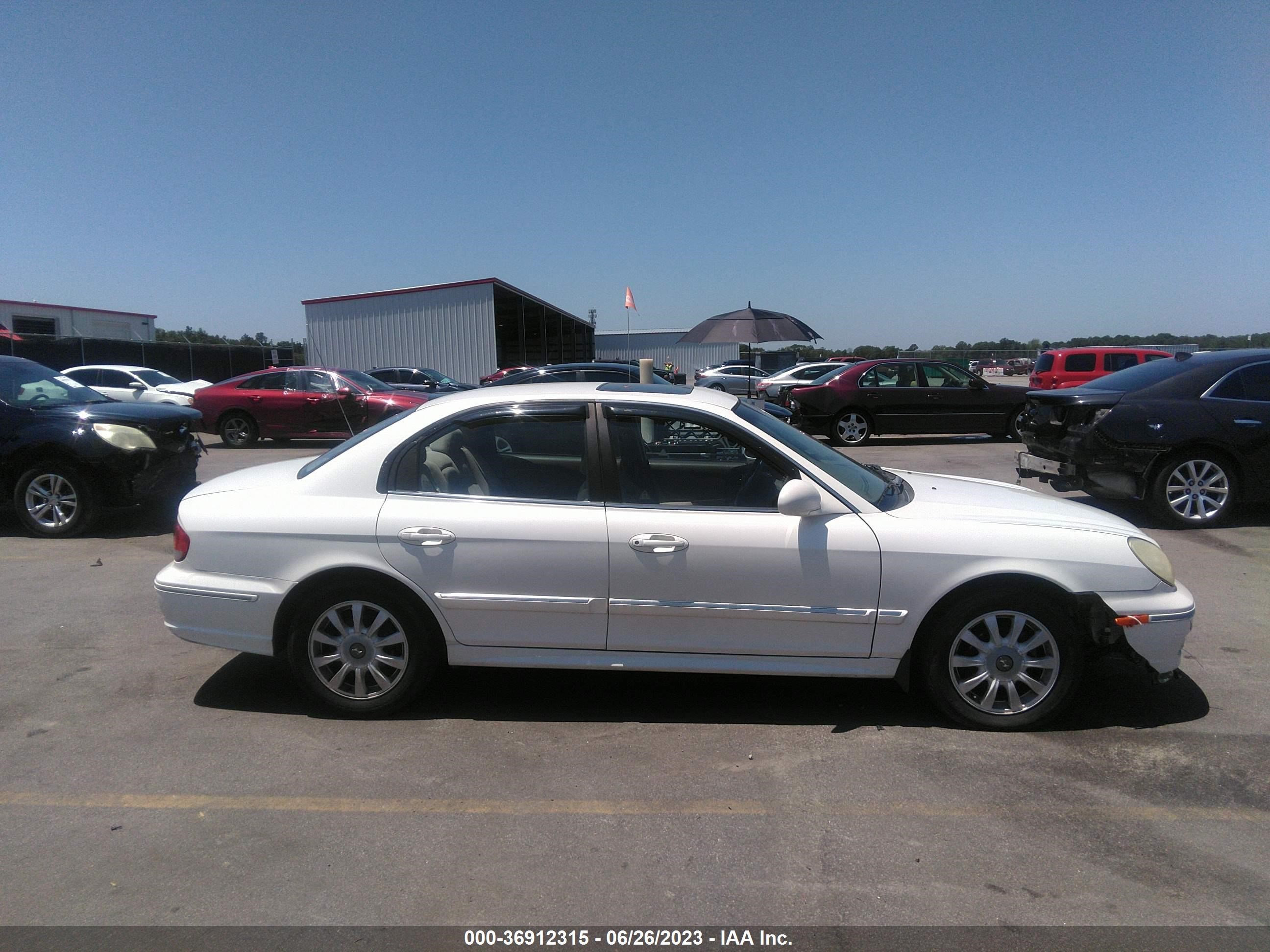 Photo 12 VIN: KMHWF35H94A945971 - HYUNDAI SONATA 