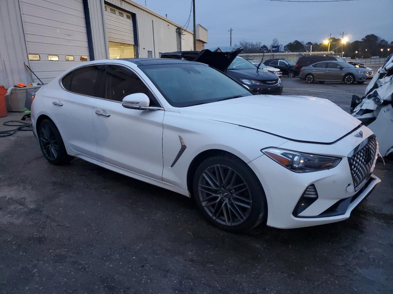 Photo 3 VIN: KMTG34LA7KU030109 - GENESIS G70 