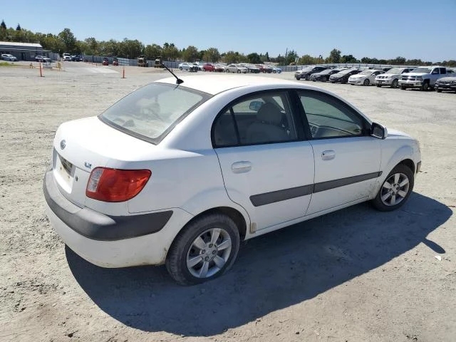 Photo 2 VIN: KNADE123X66087649 - KIA RIO 