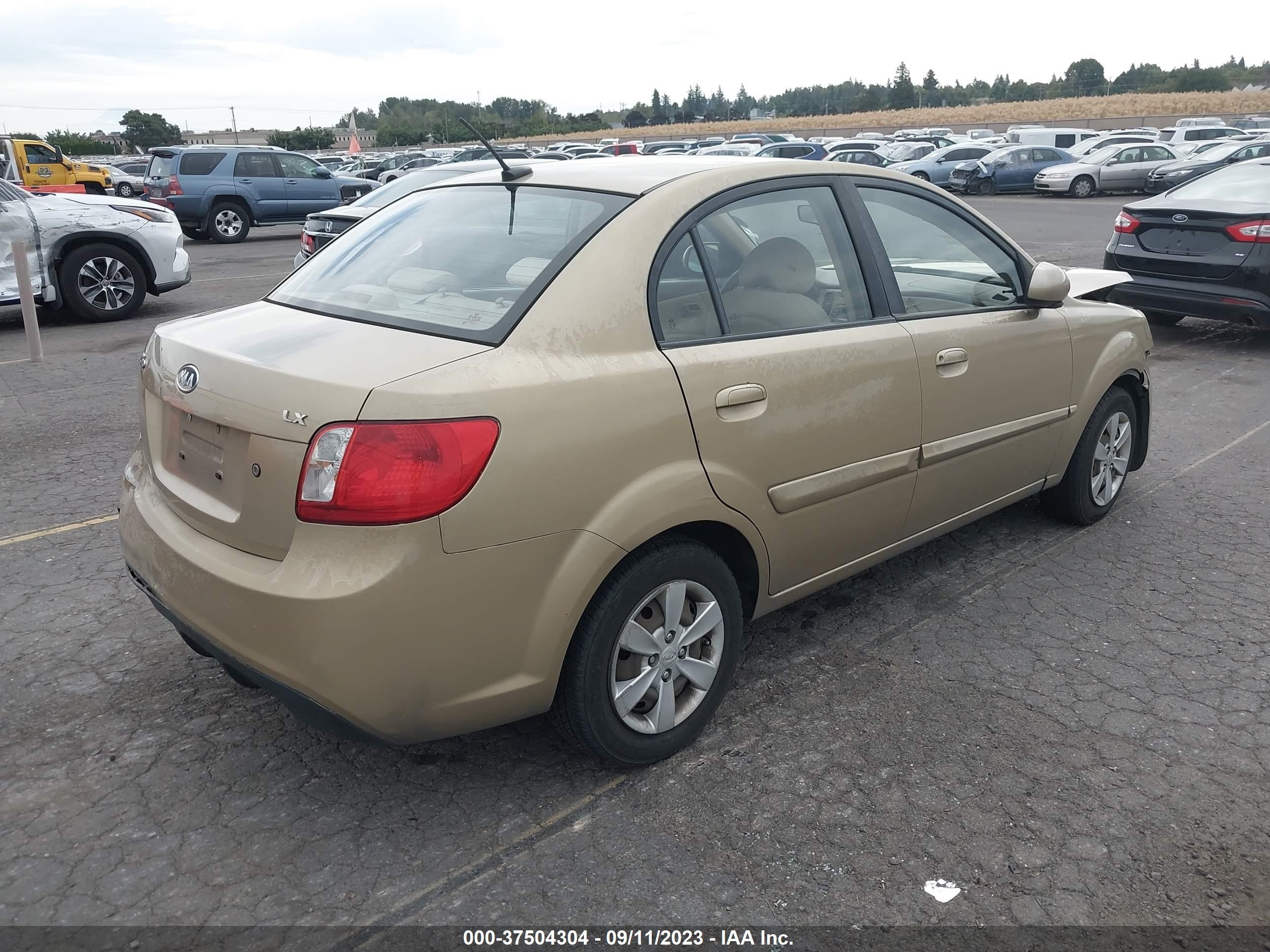 Photo 3 VIN: KNADH4A31A6610883 - KIA RIO 