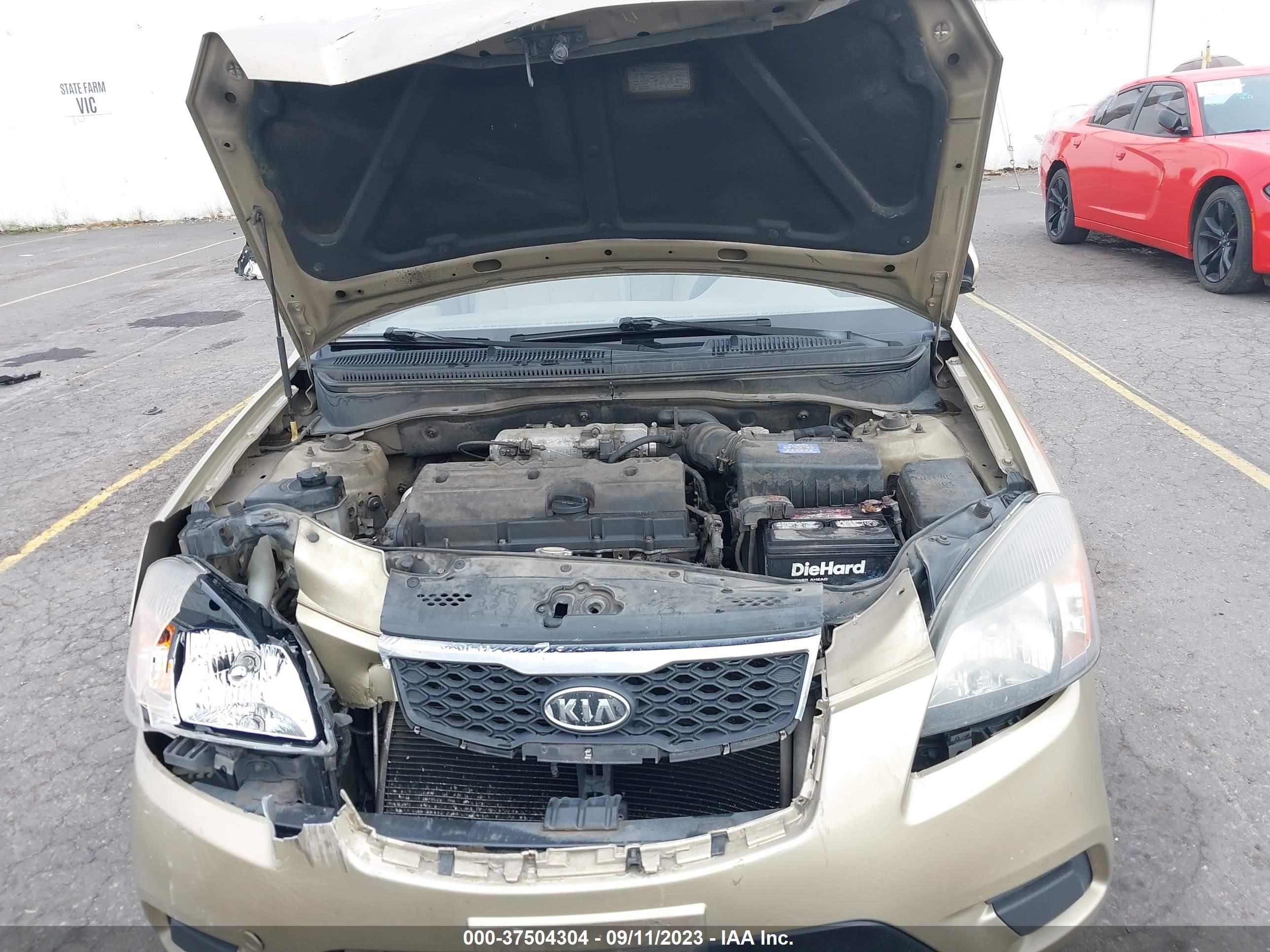 Photo 9 VIN: KNADH4A31A6610883 - KIA RIO 