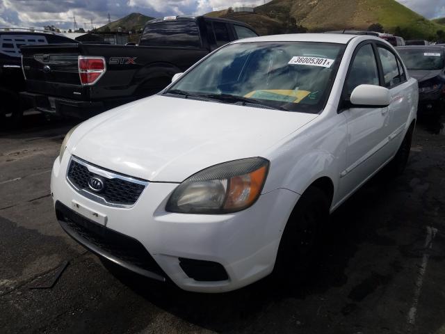 Photo 1 VIN: KNADH4A3XA6678163 - KIA RIO LX 