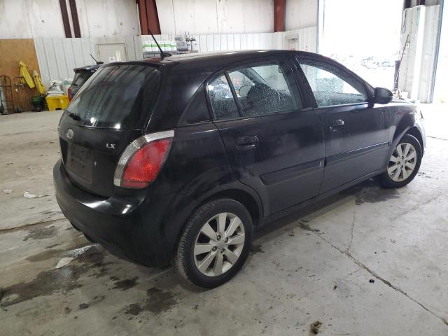 Photo 2 VIN: KNADH5A34A6668654 - KIA RIO LX 