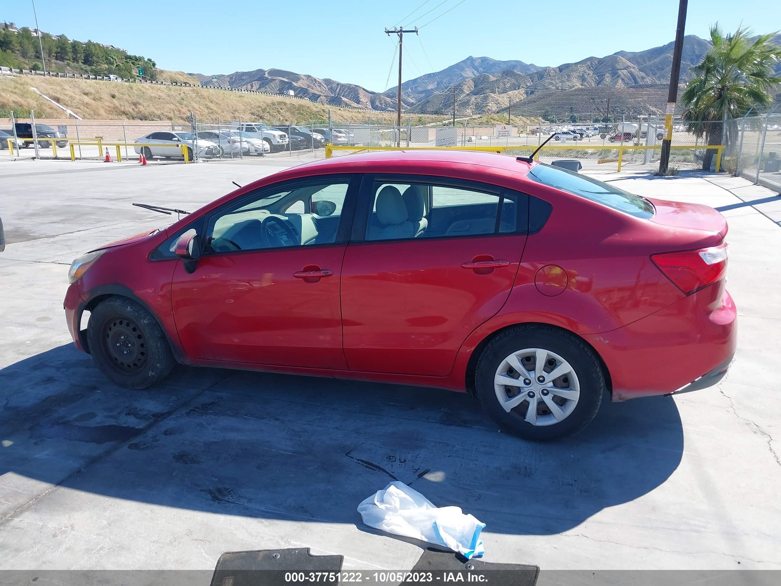 Photo 12 VIN: KNADM4A31D6231303 - KIA RIO 