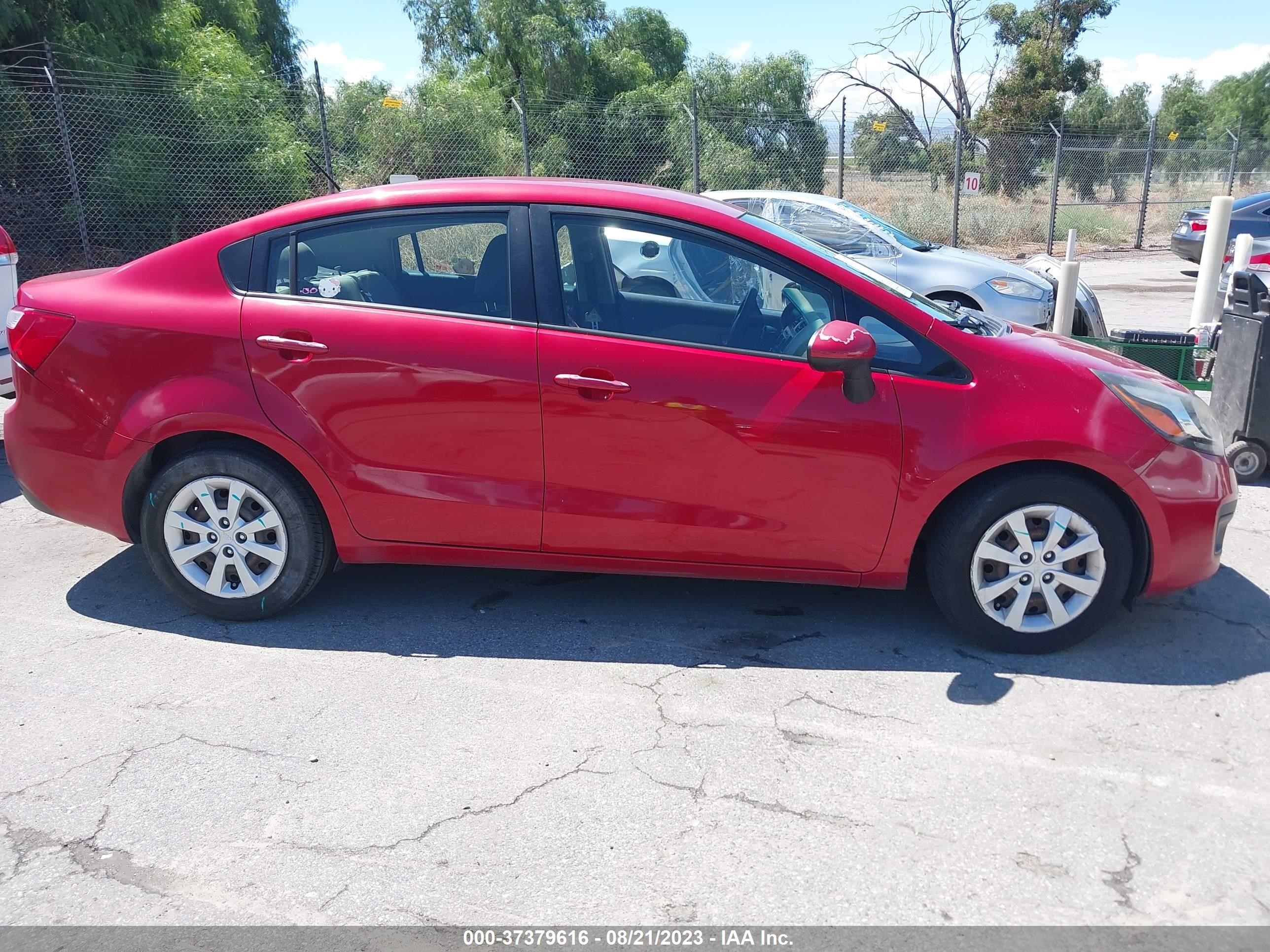 Photo 12 VIN: KNADM4A37F6504487 - KIA RIO 