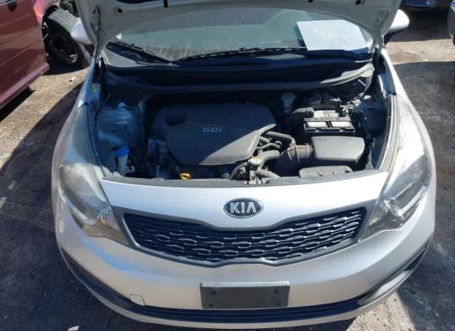 Photo 9 VIN: KNADM4A38E6400122 - KIA RIO 