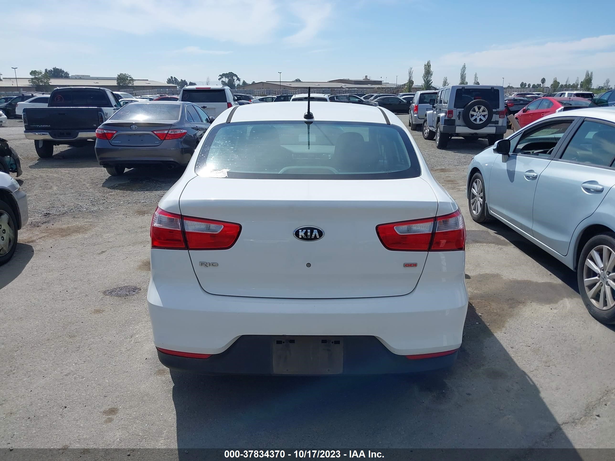 Photo 11 VIN: KNADM4A3XG6675185 - KIA RIO 