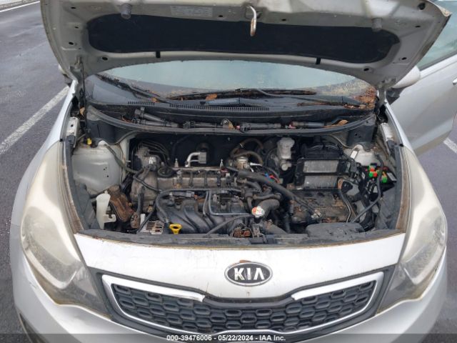 Photo 9 VIN: KNADN4A34C6059909 - KIA RIO 