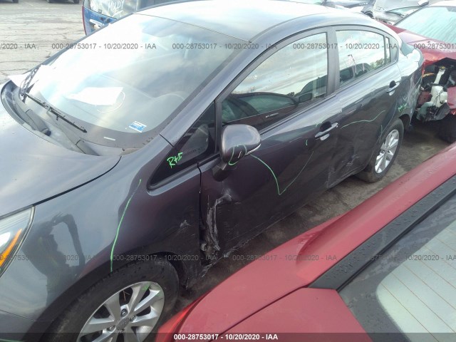 Photo 5 VIN: KNADN4A34C6077066 - KIA RIO 