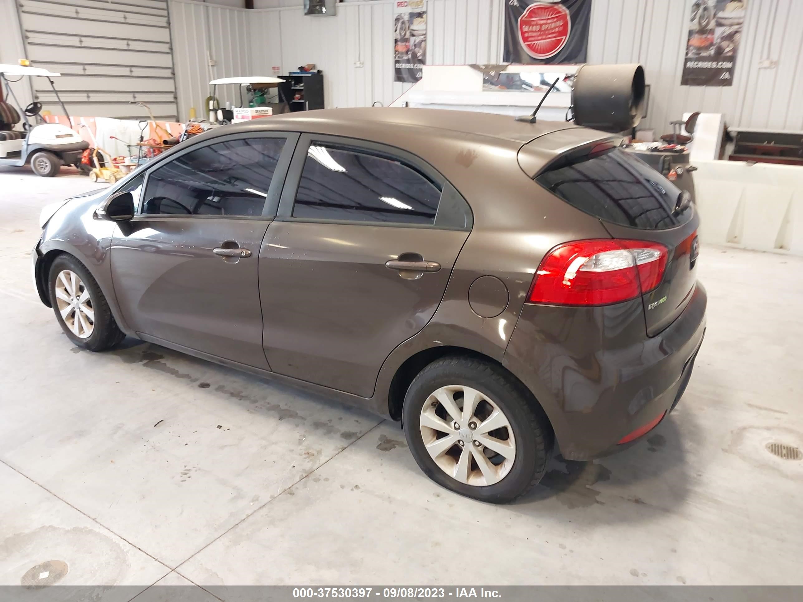 Photo 2 VIN: KNADN5A32D6303886 - KIA RIO 