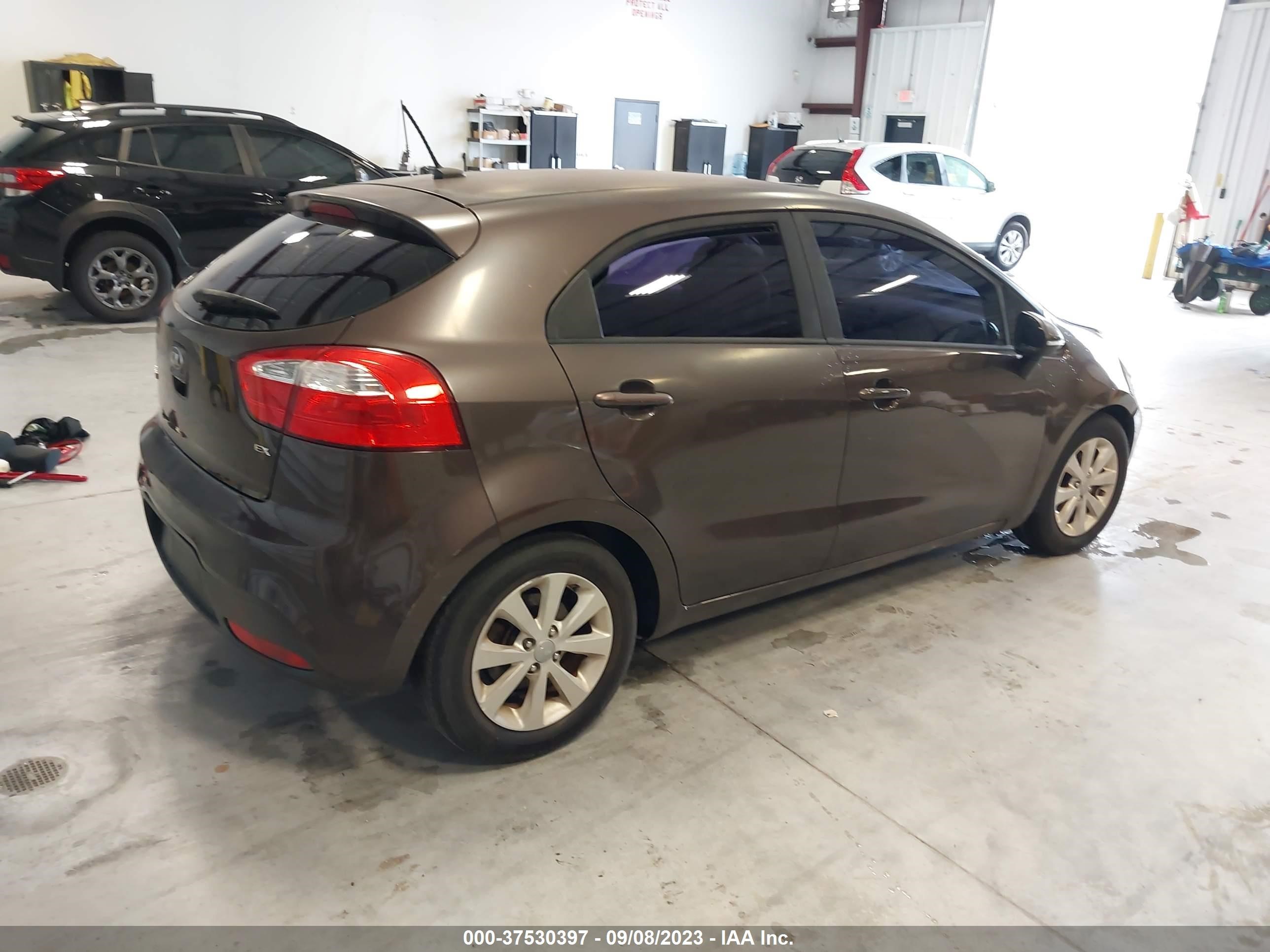 Photo 3 VIN: KNADN5A32D6303886 - KIA RIO 