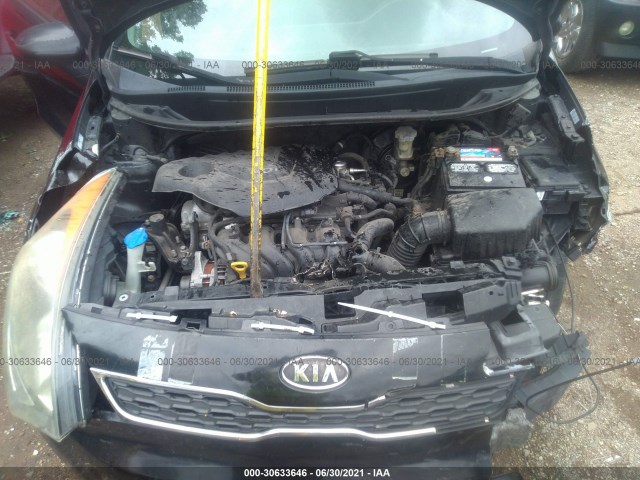 Photo 9 VIN: KNADN5A3XC6069740 - KIA RIO 