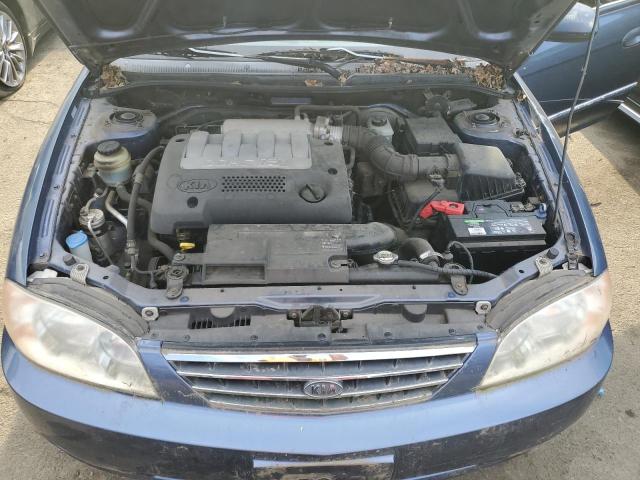 Photo 10 VIN: KNAFB121225207704 - KIA SPECTRA 