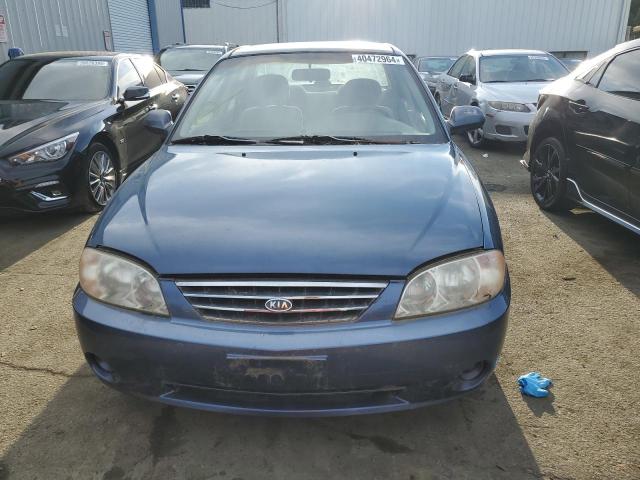 Photo 4 VIN: KNAFB121225207704 - KIA SPECTRA 