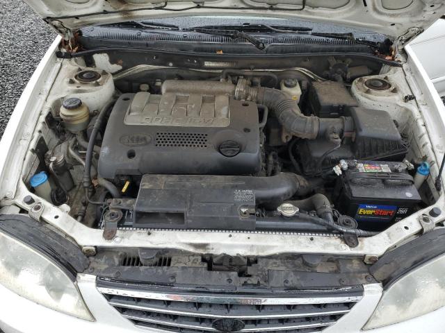 Photo 10 VIN: KNAFB121435272734 - KIA SPECTRA 