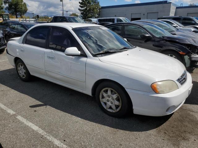 Photo 3 VIN: KNAFB121925189427 - KIA SPECTRA 