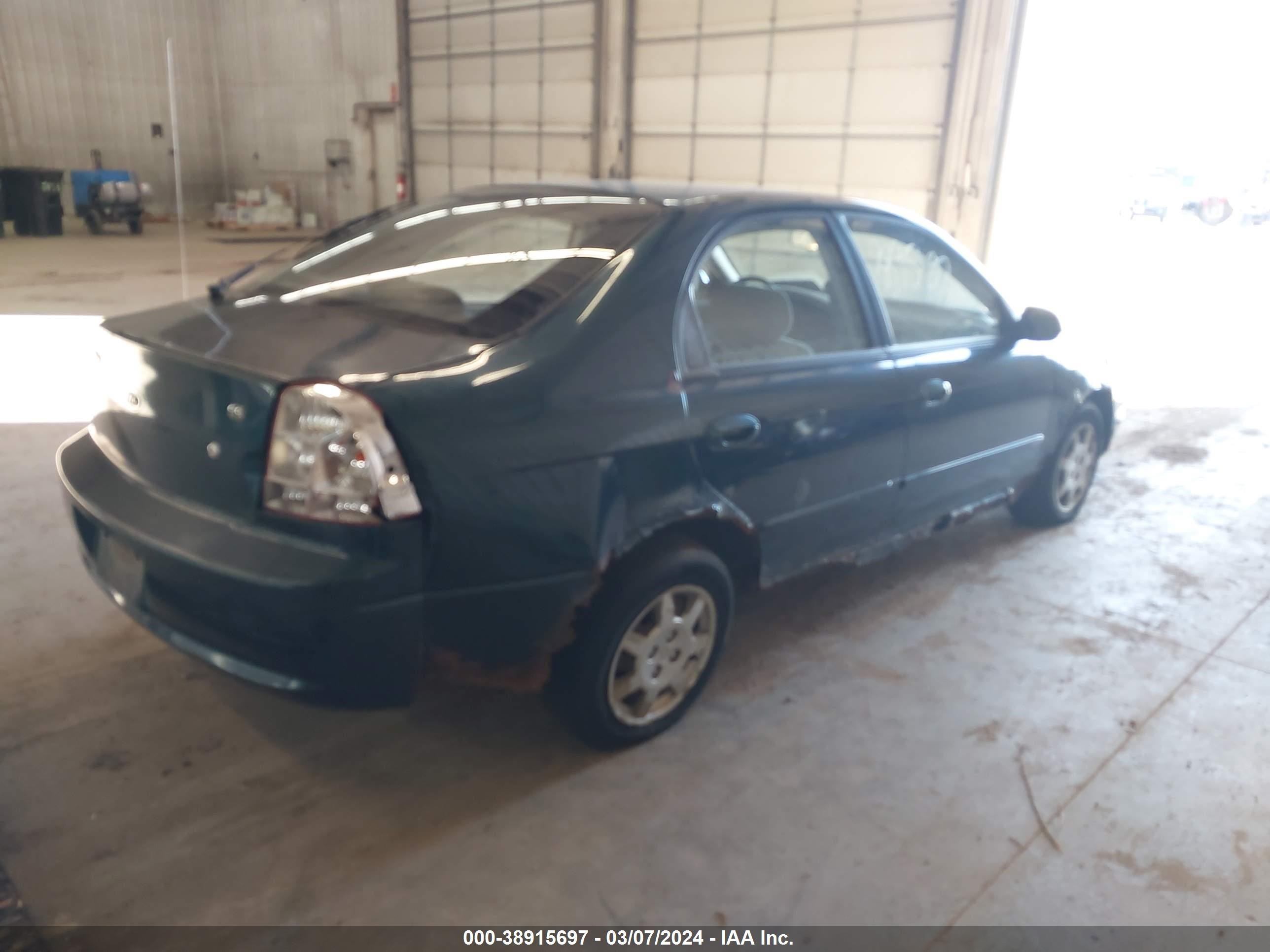 Photo 3 VIN: KNAFB161335110099 - KIA SPECTRA 