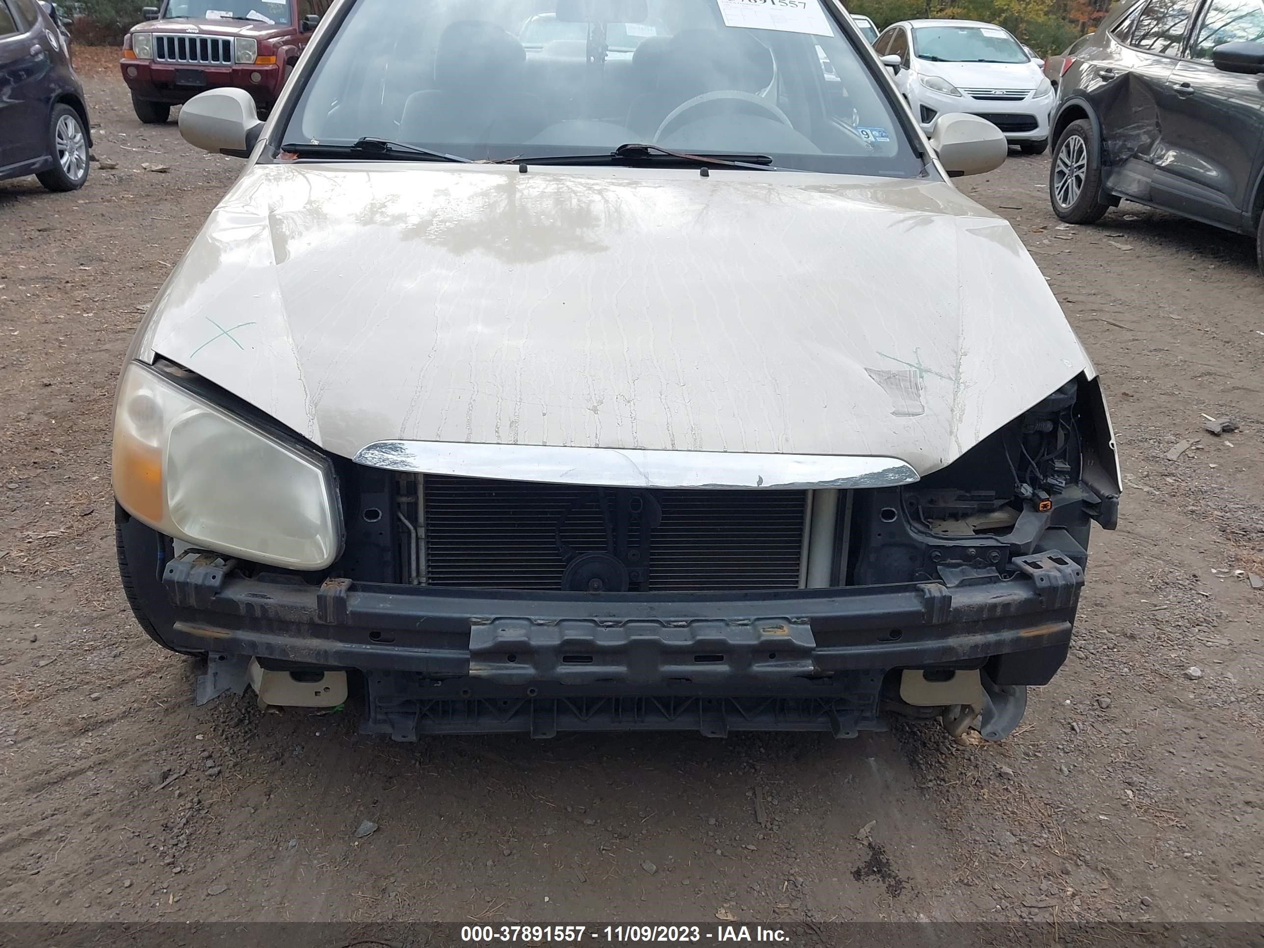 Photo 5 VIN: KNAFE121085493892 - KIA SPECTRA 