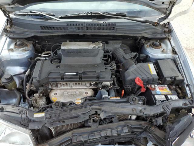 Photo 10 VIN: KNAFE122375473157 - KIA SPECTRA 