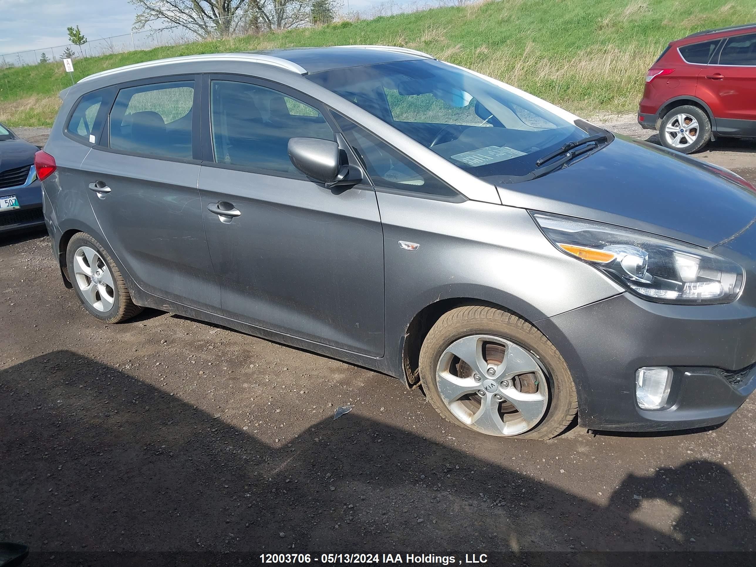 Photo 12 VIN: KNAHT8A33E7072260 - KIA RONDO 