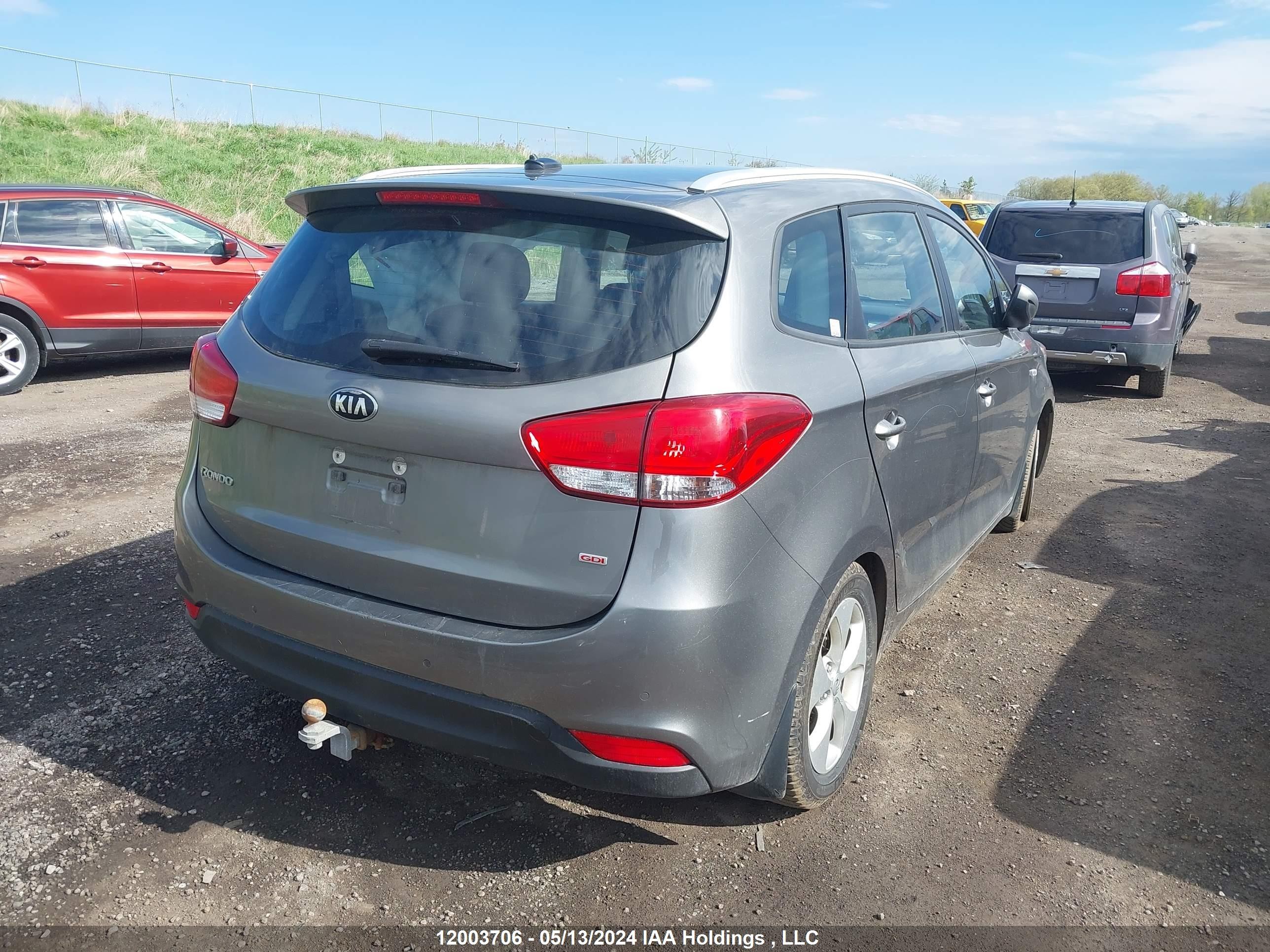 Photo 3 VIN: KNAHT8A33E7072260 - KIA RONDO 