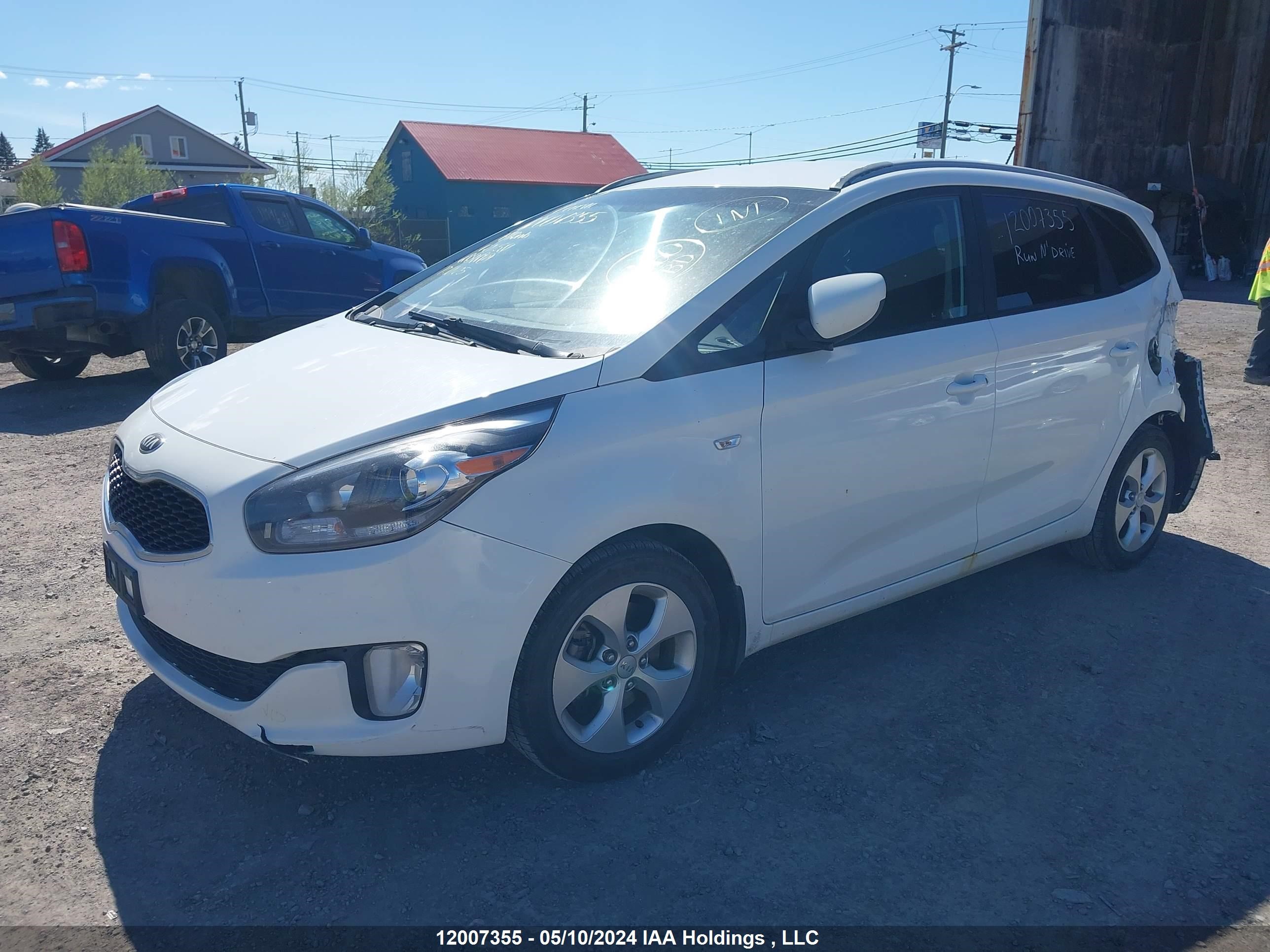 Photo 1 VIN: KNAHT8A34E7011581 - KIA RONDO 