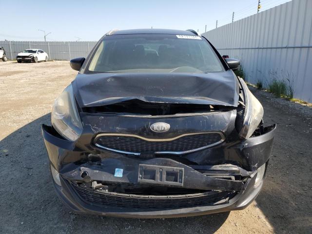 Photo 4 VIN: KNAHT8A34E7027912 - KIA RONDO 