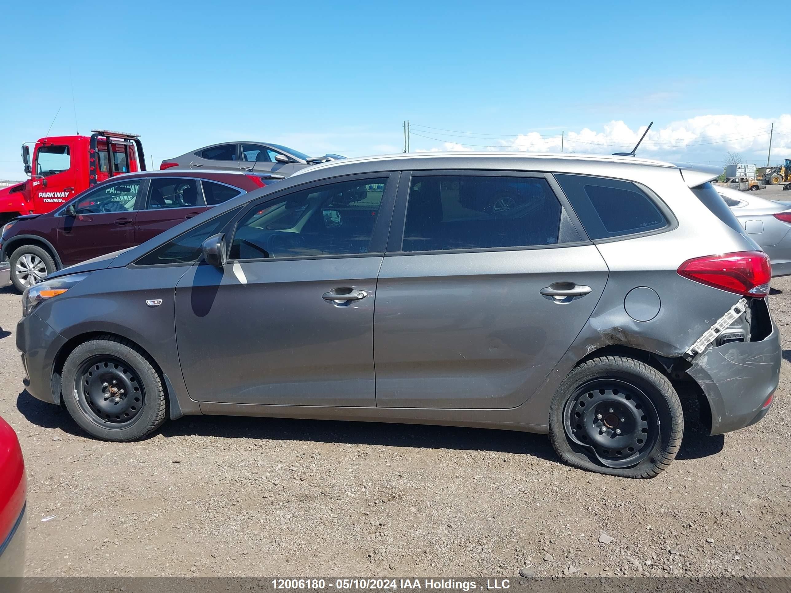 Photo 13 VIN: KNAHT8A35E7013808 - KIA RONDO 