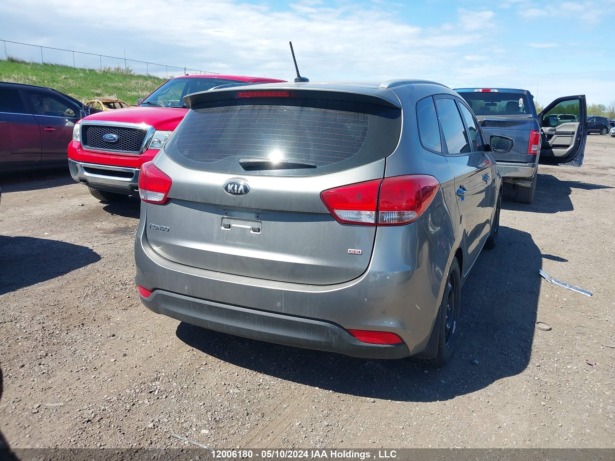 Photo 15 VIN: KNAHT8A35E7013808 - KIA RONDO 