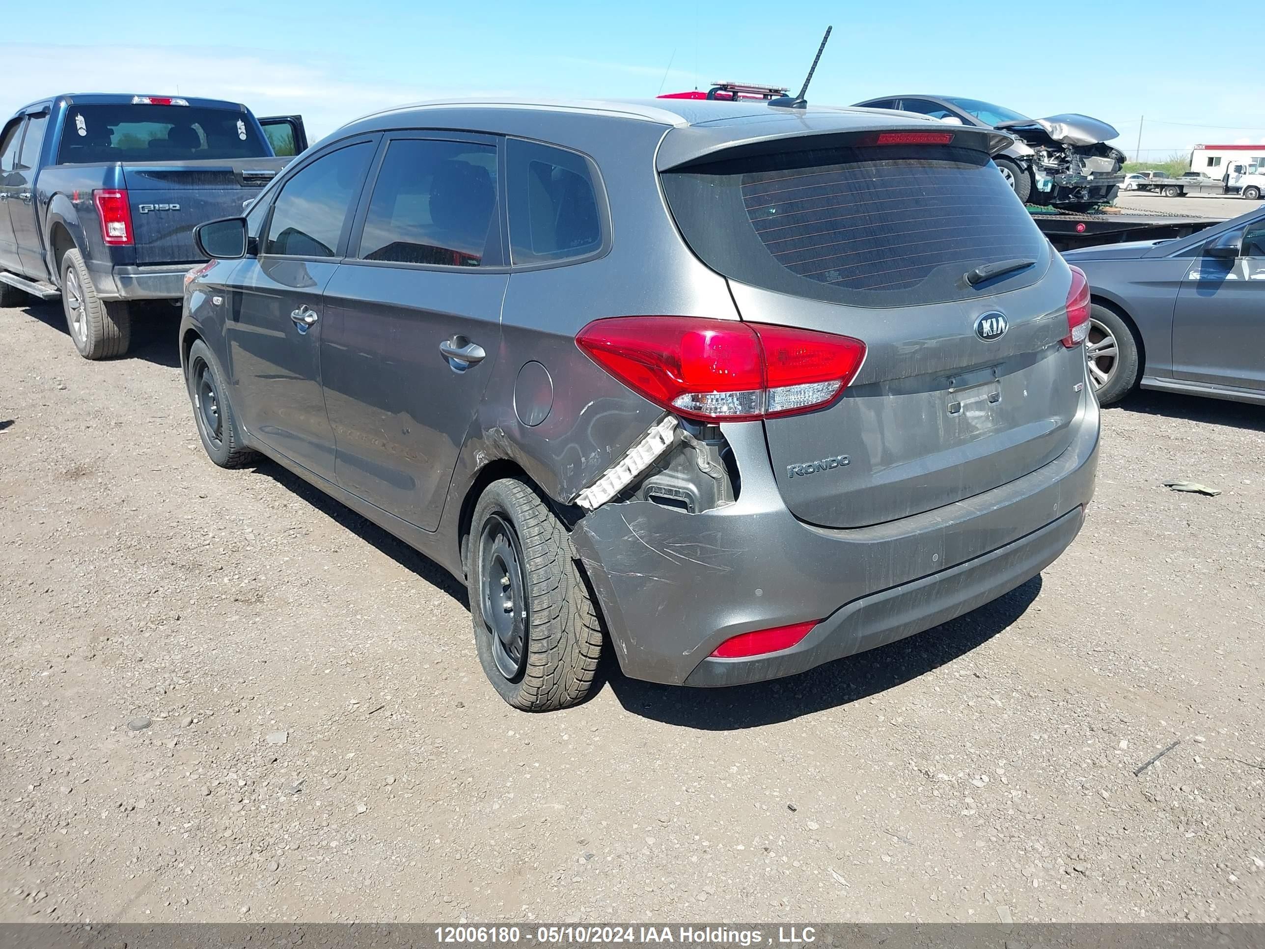 Photo 2 VIN: KNAHT8A35E7013808 - KIA RONDO 