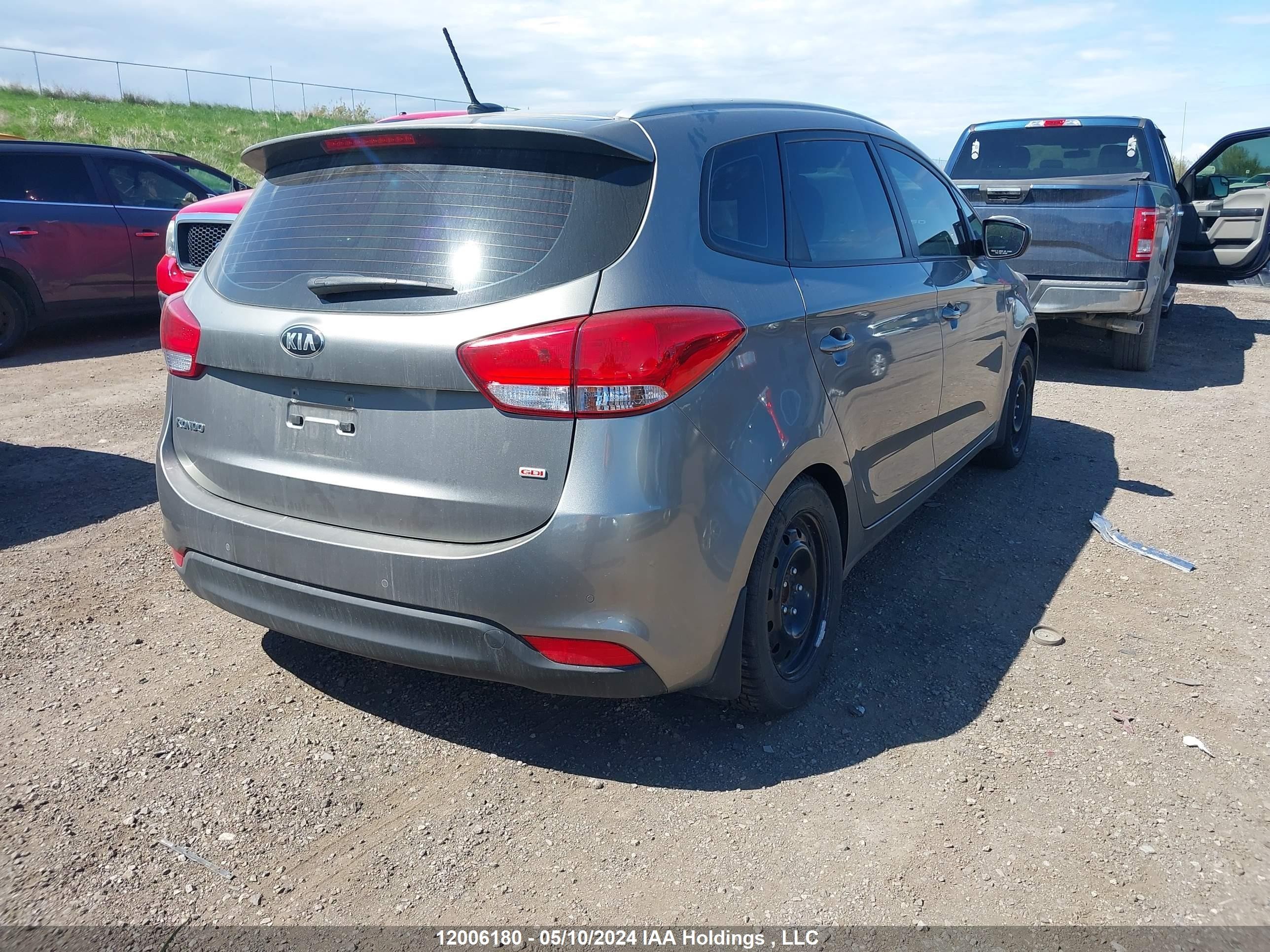 Photo 3 VIN: KNAHT8A35E7013808 - KIA RONDO 