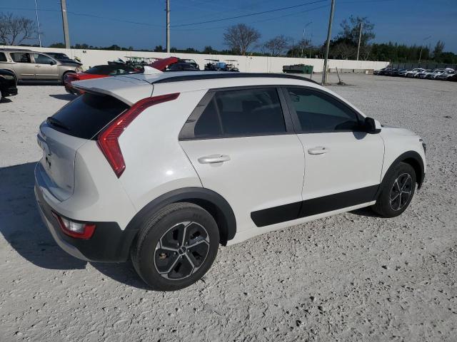 Photo 2 VIN: KNDCP3LE8P5087760 - KIA NIRO LX 