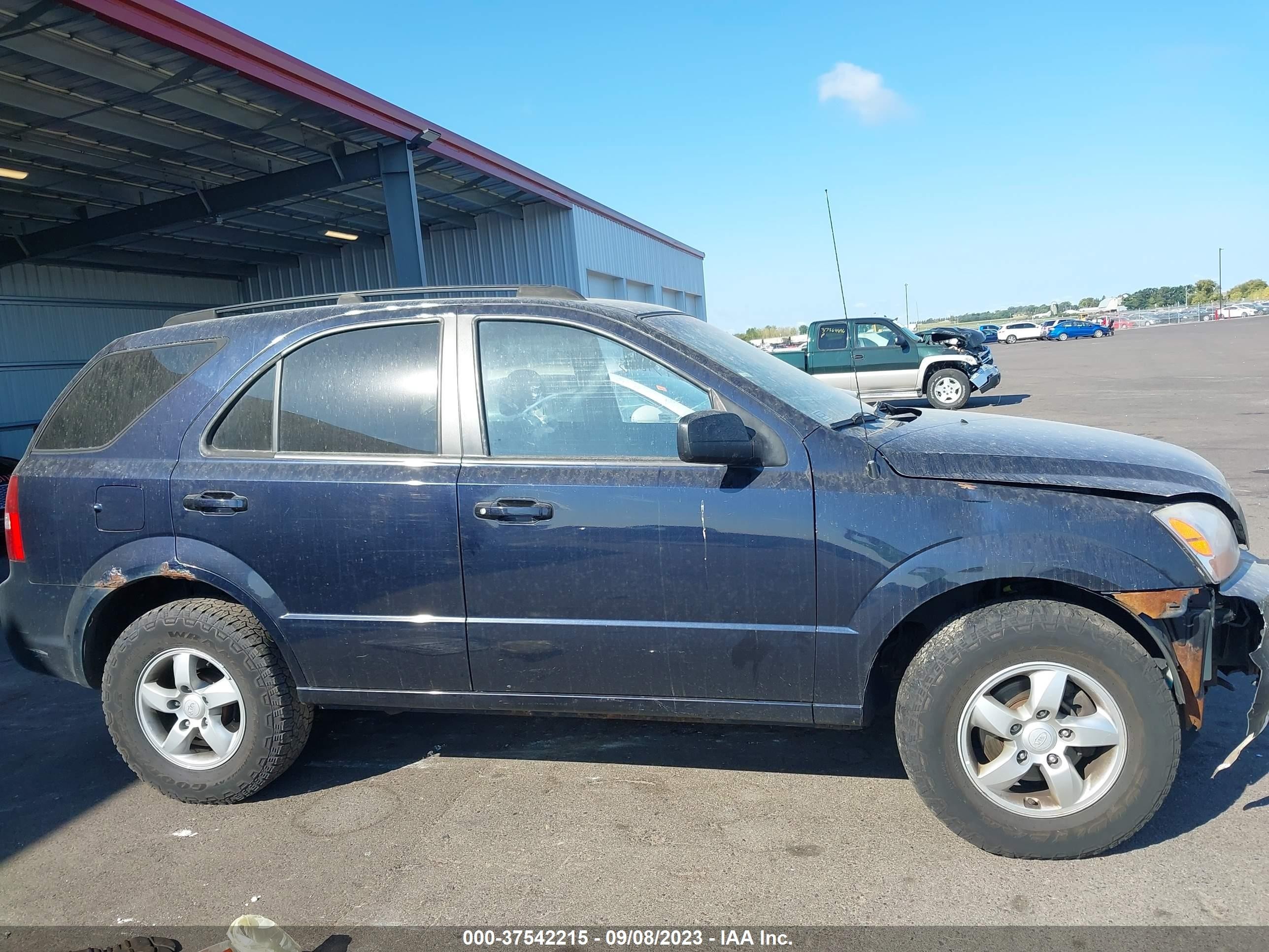 Photo 12 VIN: KNDJC735385829140 - KIA SORENTO 