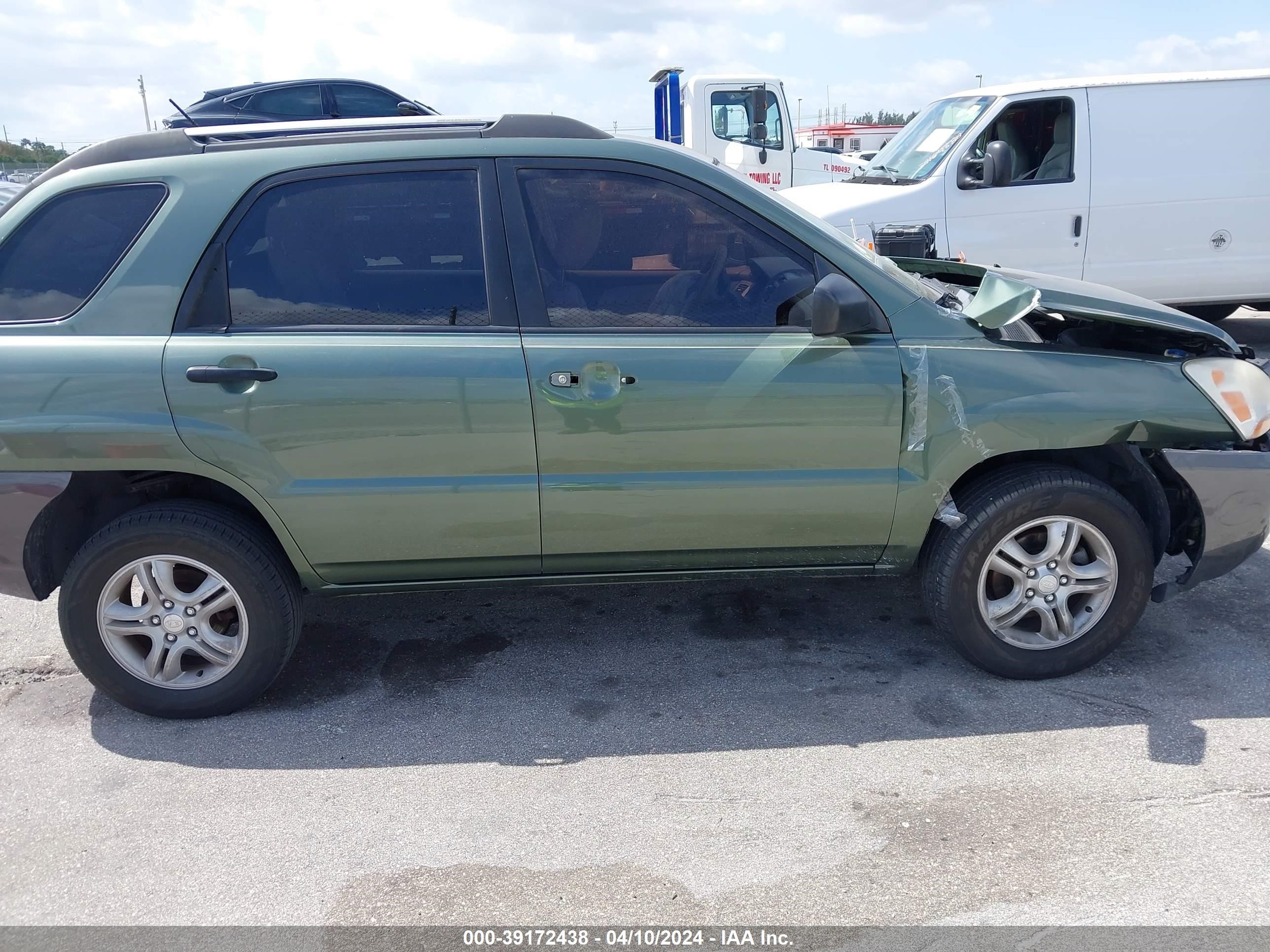 Photo 12 VIN: KNDJF724077355215 - KIA SPORTAGE 