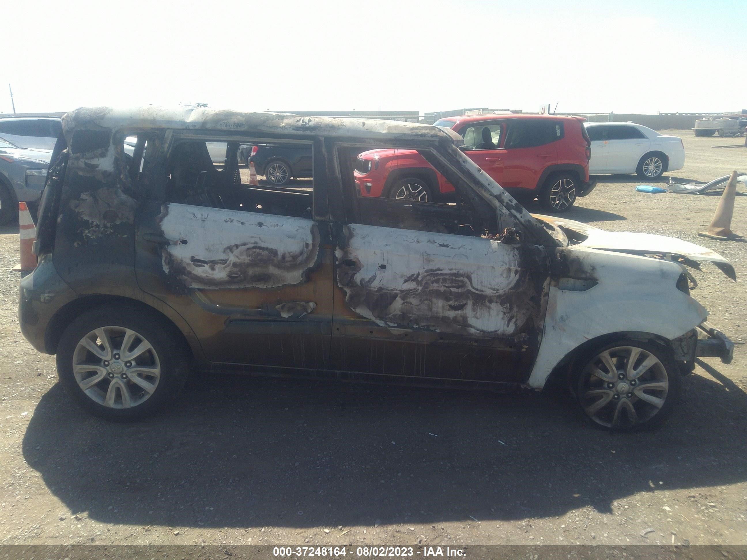 Photo 12 VIN: KNDJT2A62C7355726 - KIA SOUL 